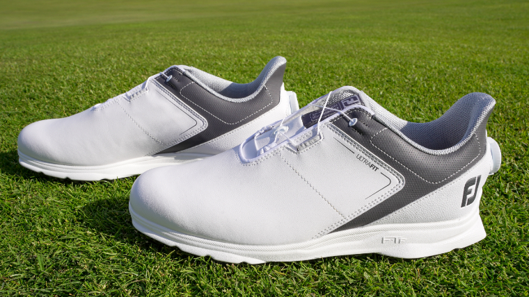 a-pair-of-FootJoy-UltraFIT-shoes-resting-on-grass