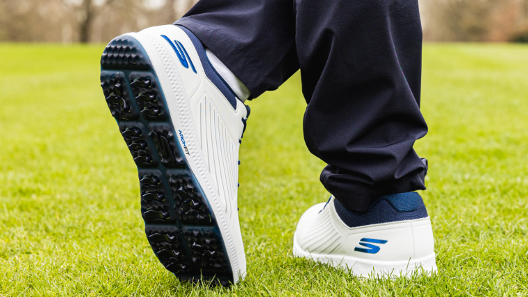 a-golfer-modelling-a-pair-of-skechers-elite-5-grip-flex-shoes