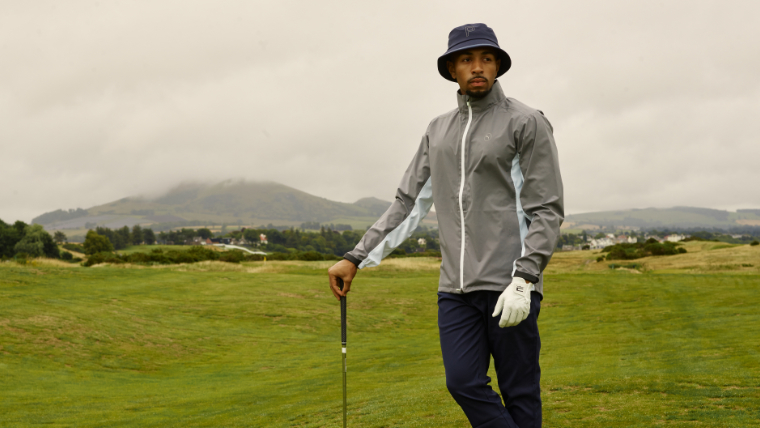 a-golfer-wearing-a-puma-waterproof-jacket