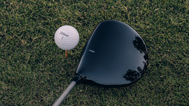 the-latest-titleist-driver-addressing-a-ball-on-a-tee