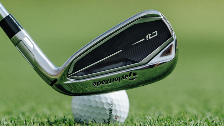 the-latest-taylormade-iron-behind-a-golf-ball-at-address