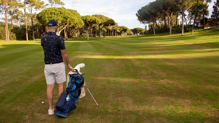 a-golfer-standing-on-a-fairway