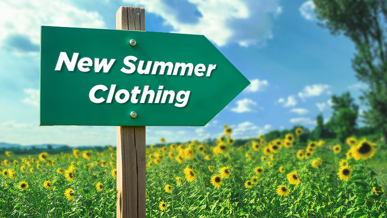 a-signpost-in-a-summer-field-that-says-new-summer-clothing