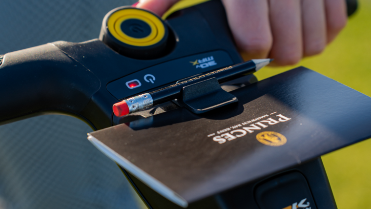 a-close-up-of-a-powakaddy-scorecard-holder