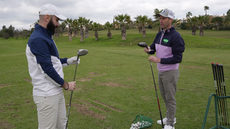 a-golfer-receiving-a-custom-fitting-from-a-golf-pro