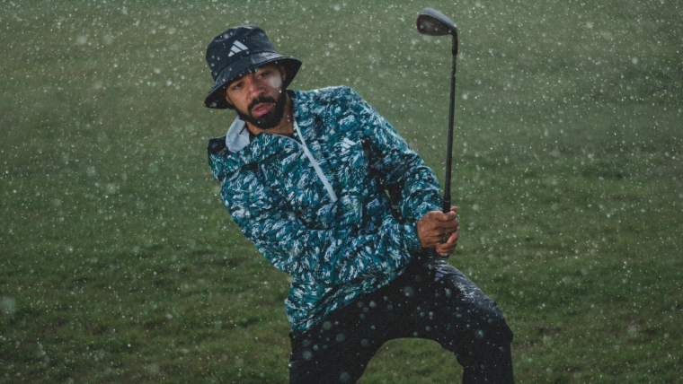 a-golfer-wearing-an-adidas-waterproof-jacket