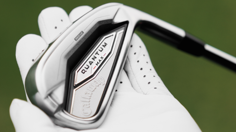 a-golfer-holding-a-callaway-quantum-max-iron