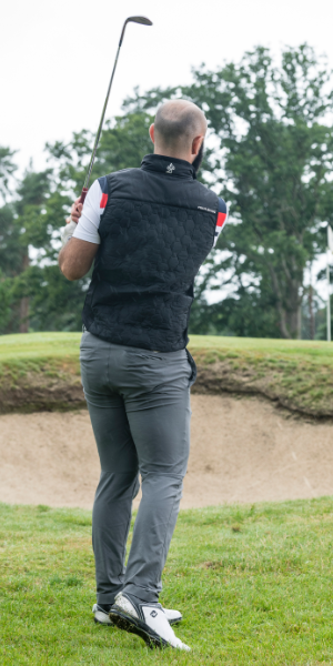 a-golfer-posing-at-the-end-of-his-swing