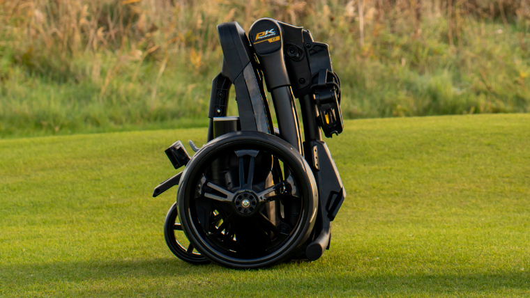 a-folded-up-powakaddy-trolley