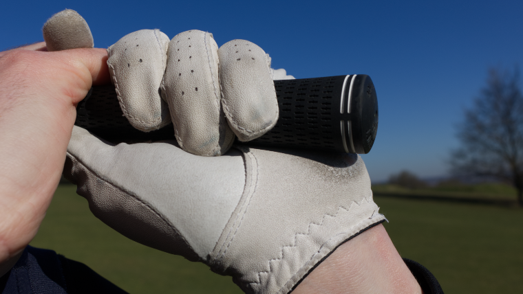 a-golfer-wearing-a-golf-glove