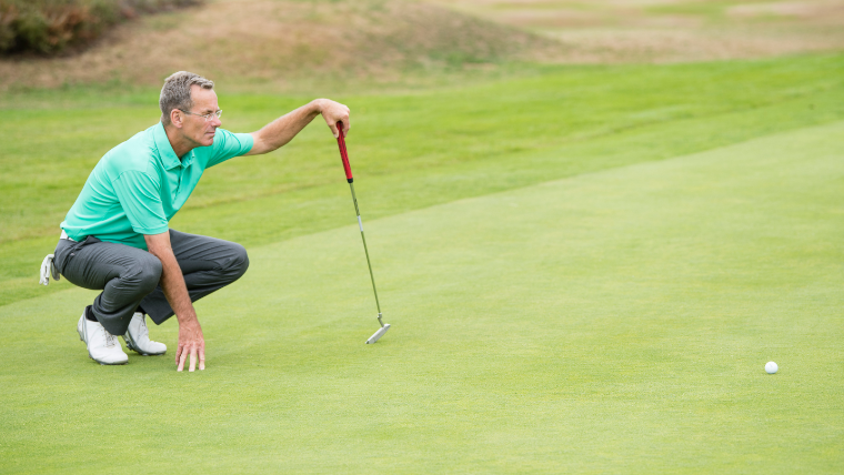 a-golfer-putting-on-a-green
